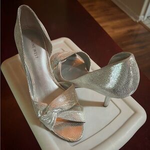 High-heeled silver shes for sale